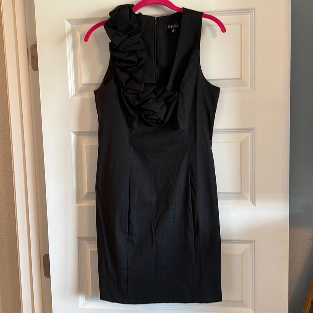 Amazing “Little Black Dress” with gorgeous detailing. Size 12